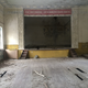 A school gymnasium where kids once played and the stage on which they performed (Terrell Jermaine Starr/The Root)